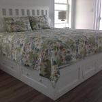 Queen Captains Bed with Cut Out Style Headboard & Storage Door in Footboard $898